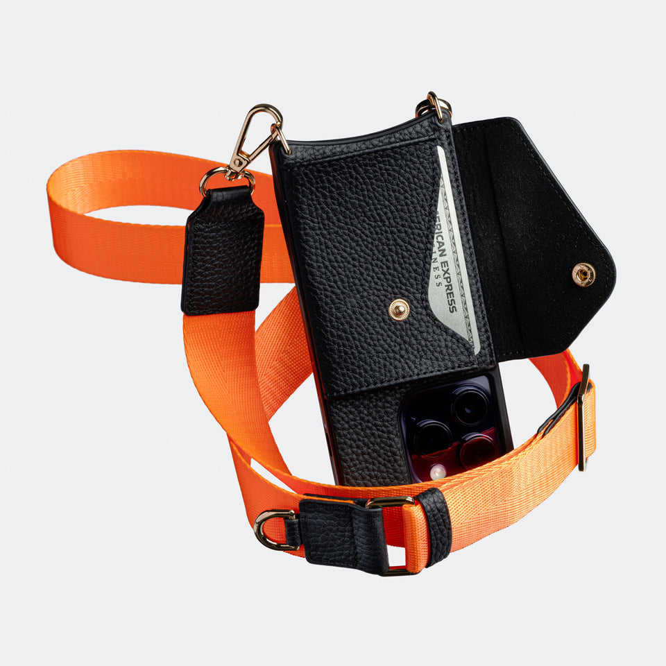 Black Bandolier-style leather crossbody phone case featuring a built-in wallet and secure card slots.
